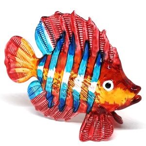 Miniature glass blown fish figurine.